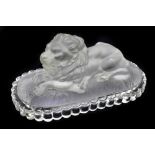 ST LOUIS; a frosted glass model of a recumbent lion, embossed mark to underside, length 13.5cm.