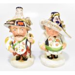 ROYAL CROWN DERBY; two figures of Mansion House dwarves comprising 'Theatre Royal Haymarket' and '