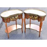 A pair of French Louis XV style walnut and gilt metal mounted kidney shaped side tables, each with a