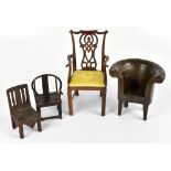 A group of four apprentice pieces comprising a Chippendale style armchair, height 24cm, a Chinese