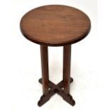 STANLEY WEBB DAVIES OF WINDERMERE; a carved mahogany occasional table, the circular top carved