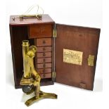 JOHN. B. DANCER; a 19th century brass microscope, with additional lenses, accessories, and an