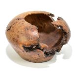 MALCOLM BROWN; a burr elm turned polished wooden sculptural bowl bearing original label to base,