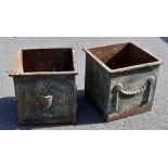 A pair of cast iron planters, 28 x 30cm.