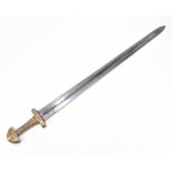 A late 19th century copy of a gladius sword with punched detail to the handle, overall length 99.