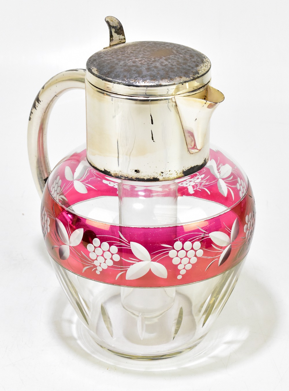 An iced water jug with chrome plated mounts, height 29cm (af).Additional InformationThe plating is