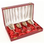 CHARLES GREEN & CO; two cased pairs of hallmarked silver wine goblets, Birmingham 1971, the