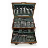 GARRARD & CO; a 1940s walnut cased twelve setting canteen of plated cutlery (one side fork