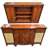 A reproduction mahogany veneered breakfront sideboard with three drawers above a pair of central