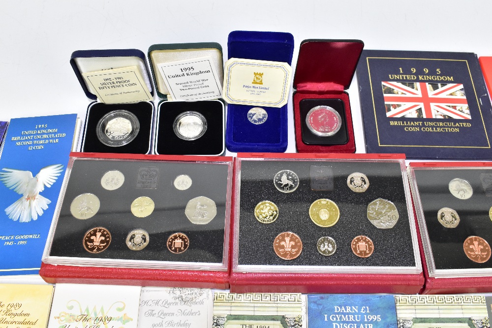 An assortment of British coinage, including Royal Mint proof sets, silver proof crown produced to - Image 4 of 4