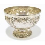 WALKER & HALL; an Edward VII hallmarked silver pedestal rose bowl with repoussé scrolling decoration