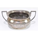 MARSTON & BAYLISS; an Edward VII hallmarked silver twin handled sugar bowl, with gadrooned