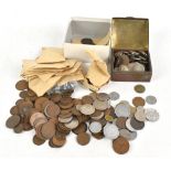 A small collection of assorted British and world coins and banknotes.