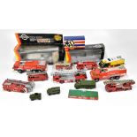 A small mixed lot of diecast model vehicles, the majority fire engines, various manufacturers