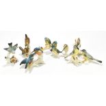 KARL ENZ; a collection of seven ceramic birds, length of largest example 20cm (7).