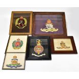 A collection of six WWI embroidered military insignia, comprising three Royal Artillery, two Royal