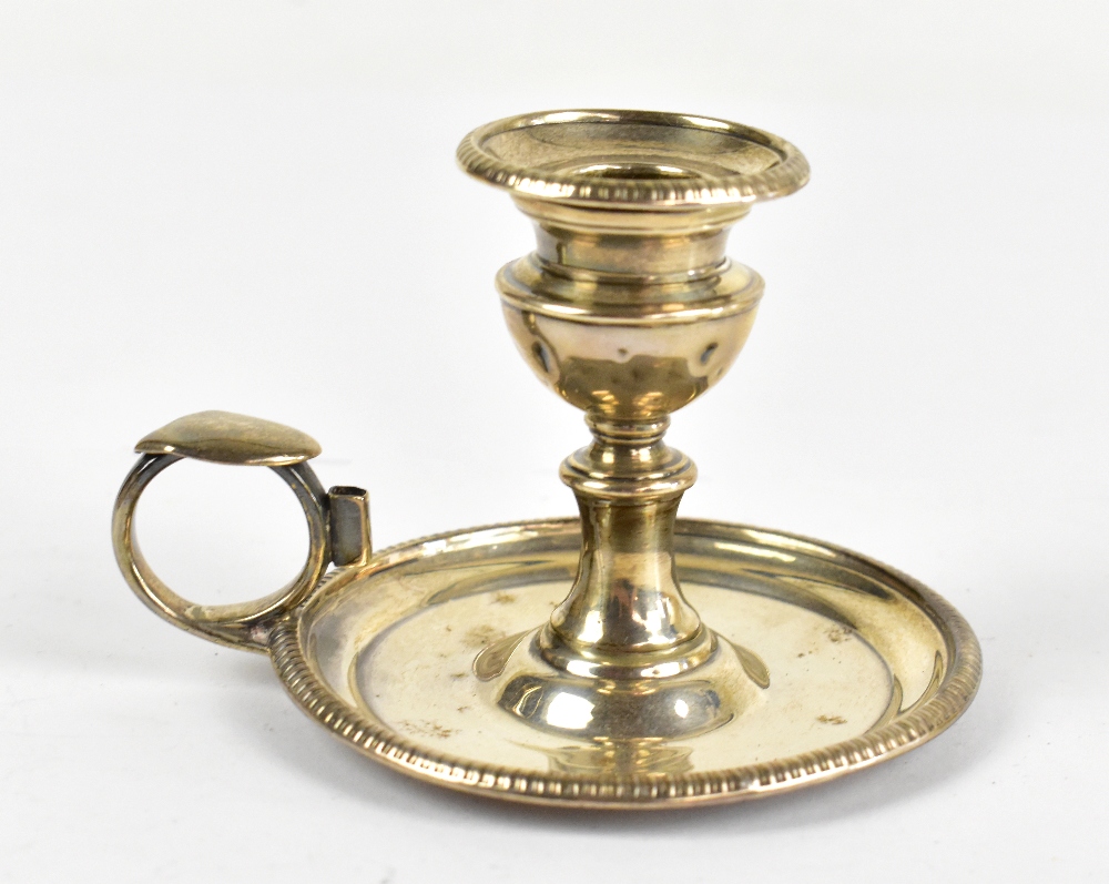 An early 19th century hallmarked silver chamberstick, indistinctly marked to the bottom, approx. 3.