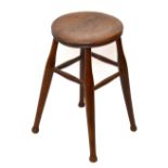 An Edwardian beech and ash vernacular stool, with circular seat on turned legs, height 52cm.