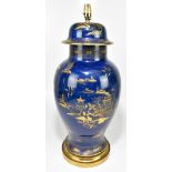 A Carlton Ware blue ground gilt heightened Chinoiserie decorated jar and cover, converted to a lamp,