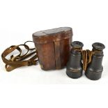 T. ARMSTRONG & BROS; a cased pair of binoculars, with plaque on case inscribed 'Presented to Trooper