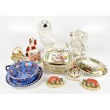 A collection of 19th century ceramics including a pair of Staffordshire recumbent greyhounds on a
