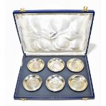 COOKE & KELVEY OR CALCUTTA AND DELI; a cased set of six Indian white metal dishes, each set with a