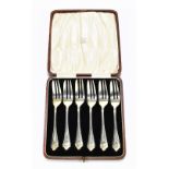 BARKER BROS SILVER LTD; a cased set of six George V hallmarked silver pastry forks, Birmingham 1929,