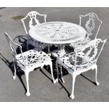 A white painted aluminium circular garden table with pierced floral decoration, height 68cm, and a