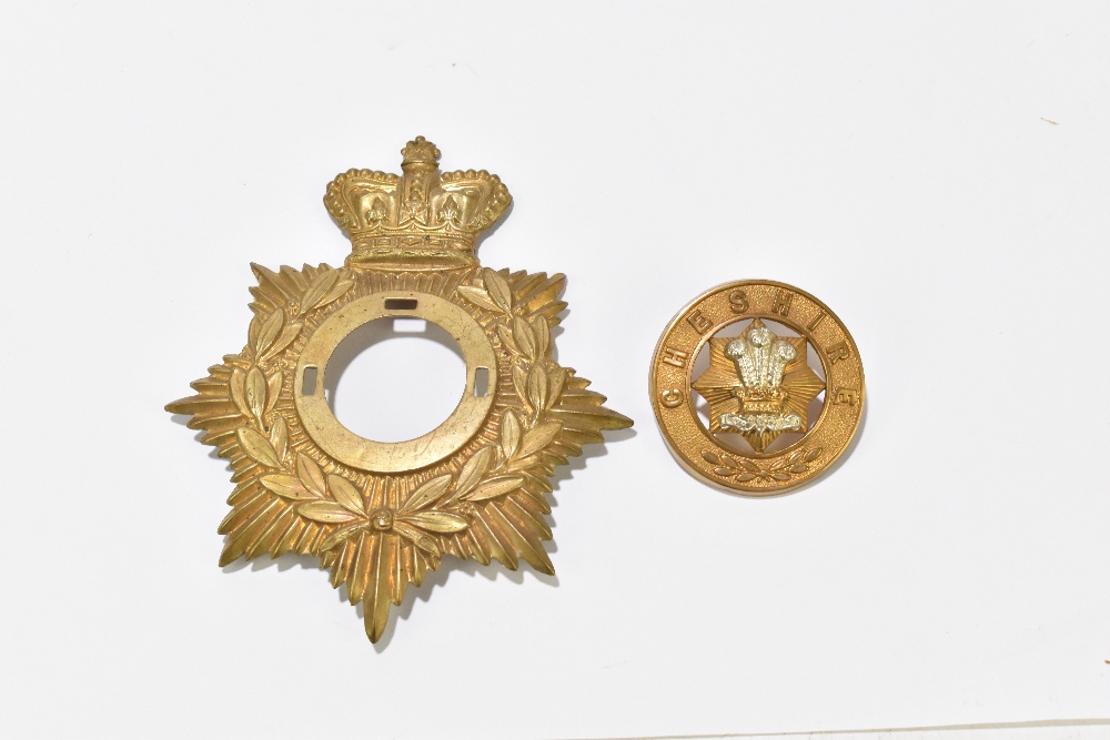 A Cheshire Regiment gilt metal helmet plate of two piece construction with lug fittings.Additional - Bild 3 aus 3