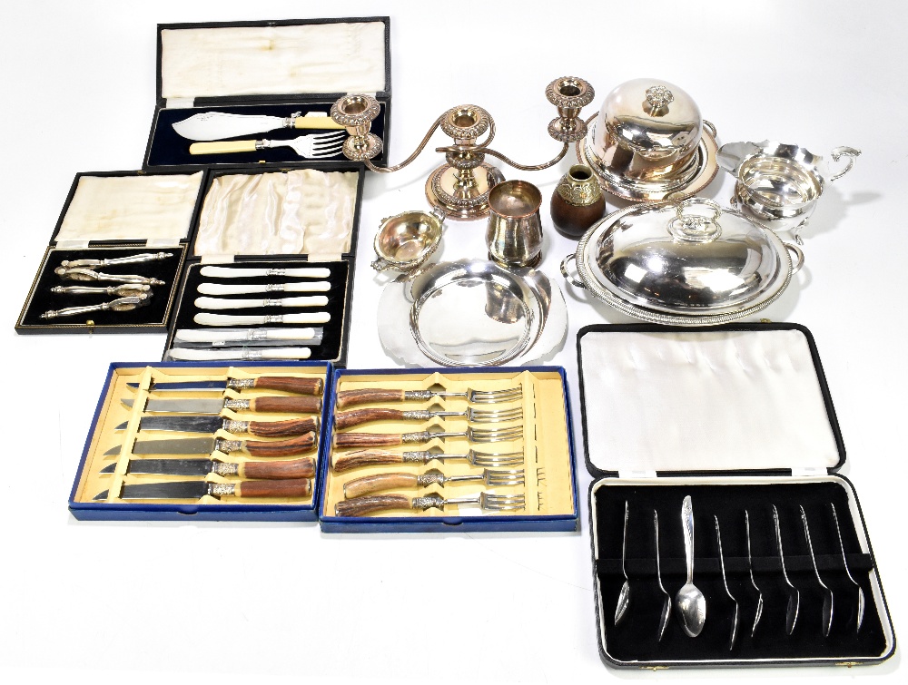 A small quantity of assorted silver plate including a three branch candelabrum, a muffin dish, an