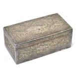 An early 20th century Indian white metal cigarette box of rectangular form with relief decoration of