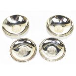 A pair of Hong Kong sterling silver small circular pin dishes, diameter 8.75cm, and a pair of