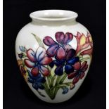 WALTER MOORCROFT; a shouldered vase decorated in the 'Spring Flowers' pattern on an ivory ground,