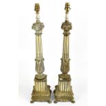 A pair of decorative metal table lamps, height including fitment 67.5cm. Provenance; purchased