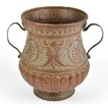 A 17th/18th century Dutch embossed copper twin handled wine cooler, height 34cm.