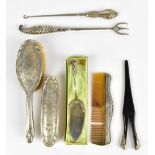 A small collection of hallmarked silver items  including a part dressing table set, a clock stand, a