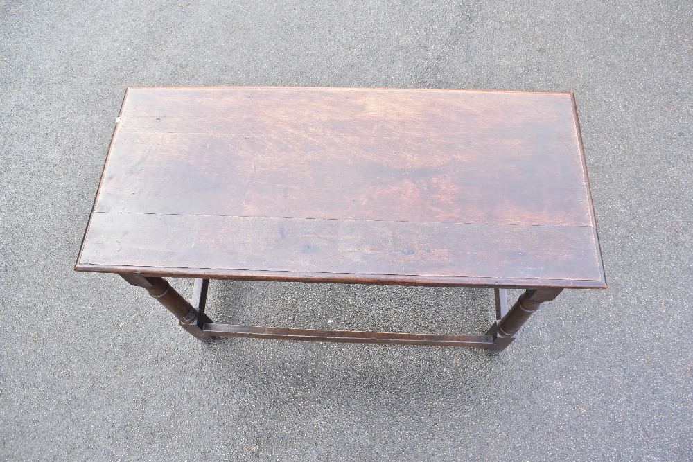 An 18th/19th century oak hall/side table with rectangular top above carved frieze with initials ' - Bild 2 aus 4