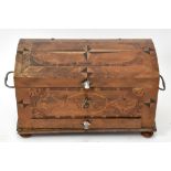 A 19th century German inlaid walnut dome top trunk of small proportions, height 36cm, width 59cm,