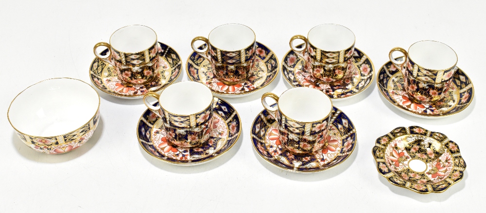 ROYAL CROWN DERBY; a six setting part tea service decorated in the 2451 pattern comprising six cups,