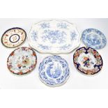 A collection of 19th century and later ceramics, the majority being blue and white, including shaped