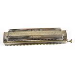 HOHNER; the sixty four chromonica harmonica, cased.