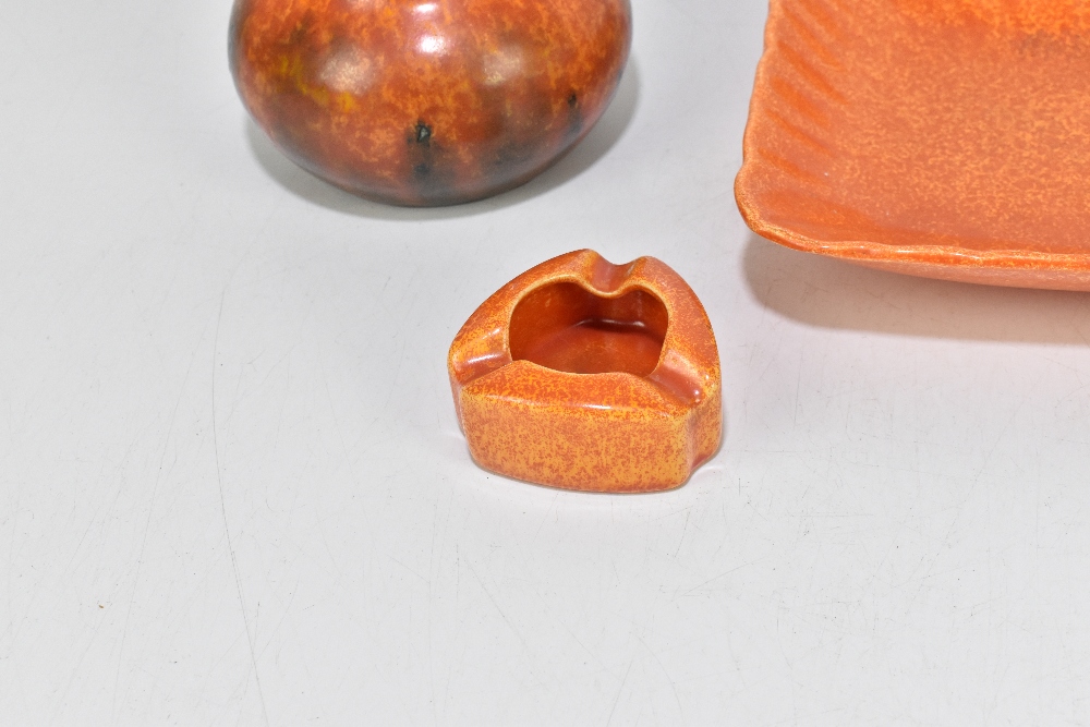 ROYAL LANCASTRIAN; five pieces decorated in an orange vermillion glaze including a pair of squat - Image 5 of 6