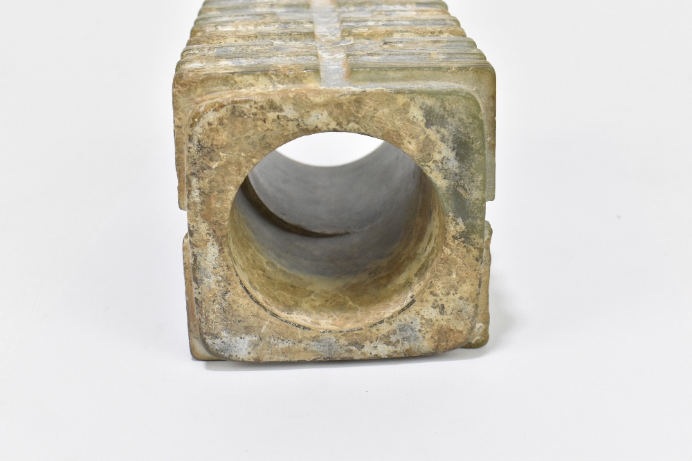 An archaic jade cong with nine horizontal bands to the body, height 13.5cm, width 8.5cm. Provenance: - Image 5 of 11