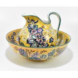 WEMYSS WARE; a later decorated toilet jug and bowl, now with floral sprays on a yellow ground, the