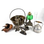 A brass jam pan, an oil lamp with green glass reservoir, food choppers, etc.