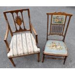 An Edwardian inlaid mahogany open arm elbow chair, and a side chair (2)