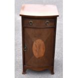 An Edwardian mahogany bowfronted bedside cabinet, height 76cm, width 37cm, depth 40cm.Additional