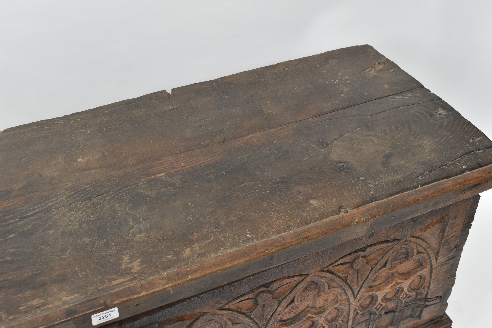An 18th century blanket box, the hinged lid above a Gothic carved panel front, width 151cm, depth - Bild 6 aus 8