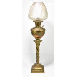 A brass oil lamp, with a frosted glass shade, height 74cm.Additional InformationMetal with age