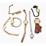 A group of seven lady's vintage wristwatches including a 9ct gold headed example.